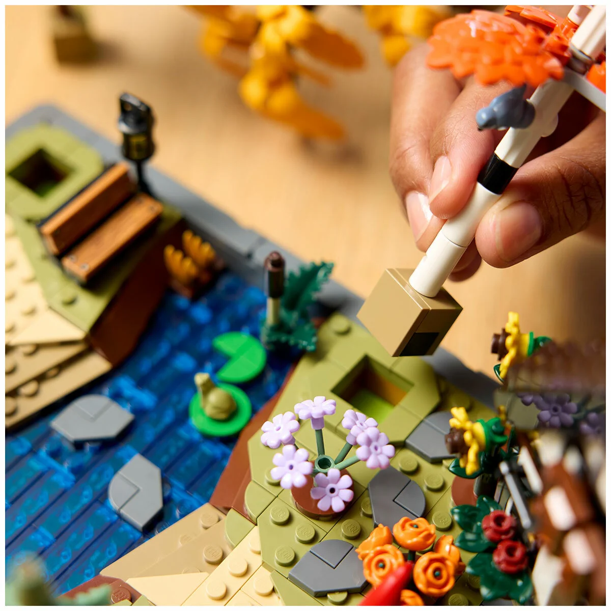 LEGO Icons Autumn Cottage Garden 11372 1102-Piece Building Set - Image 6