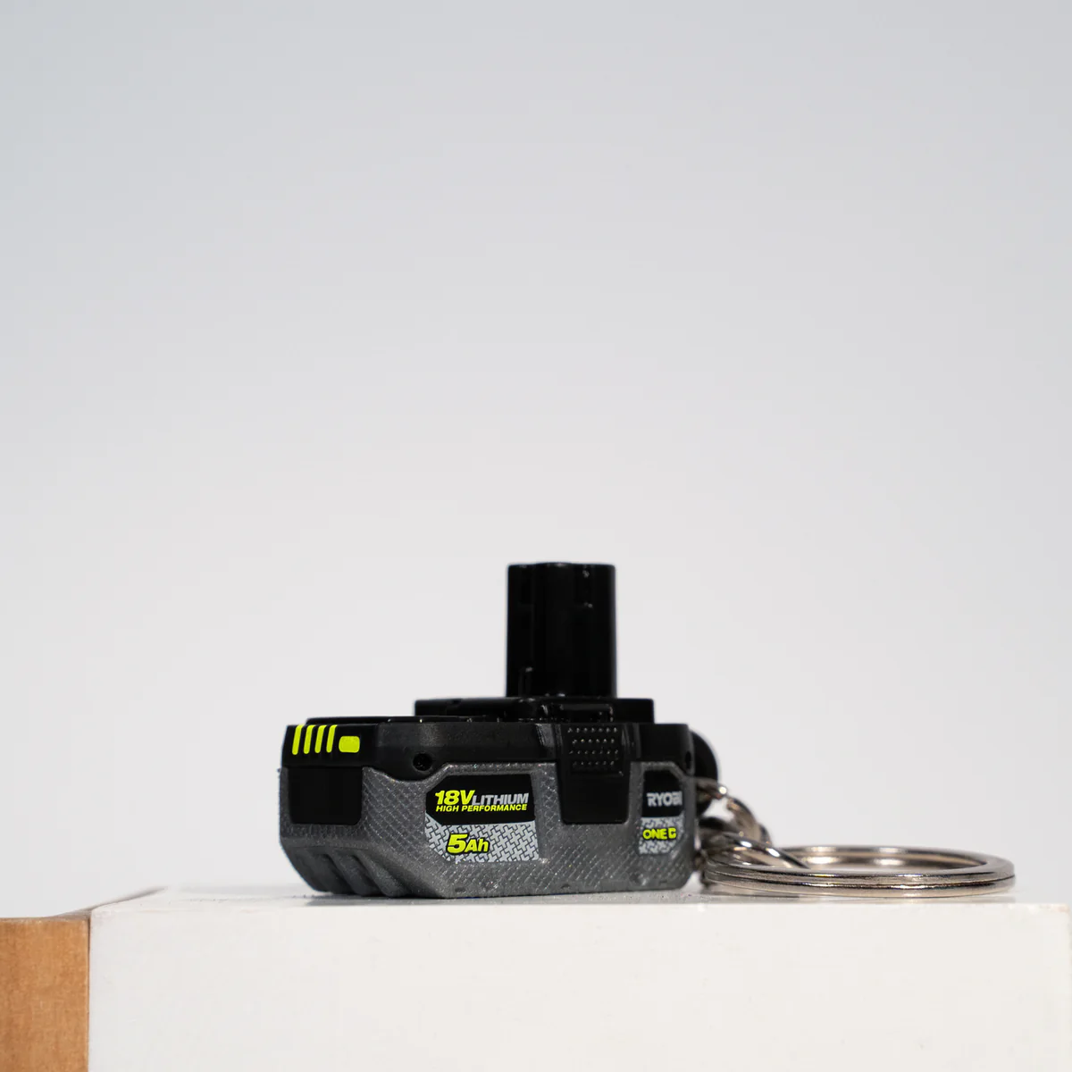 Ryobi Mini S Battery Keyring - 21mm x 41mm x 27mm - 100% Recycled Plastic - Image 2
