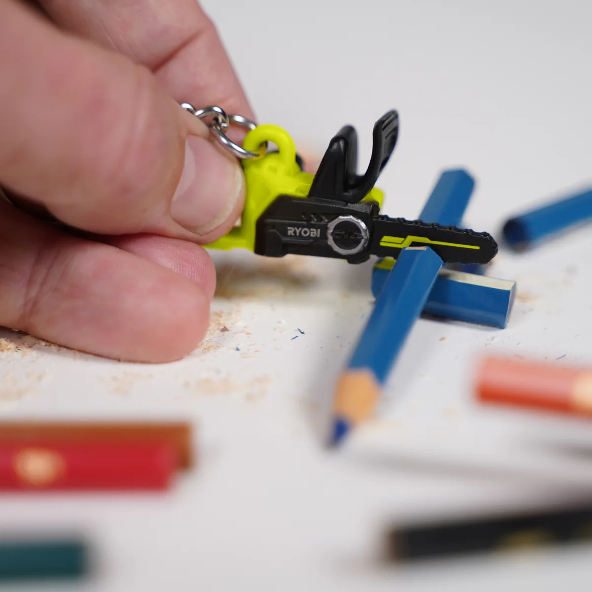 Ryobi Mini S Chainsaw Keyring - Collectible Replica - 58mm x 73mm - Image 2
